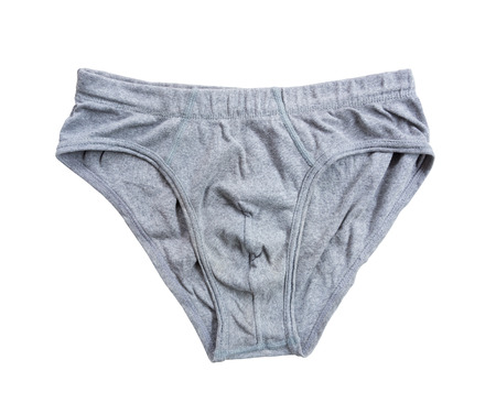 Grey men pants on the white background.の写真素材