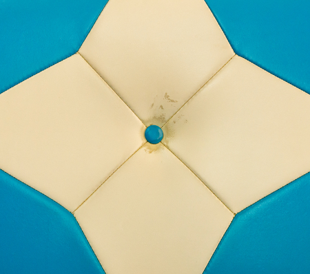 Old leatherette sofa in the beauty salonの写真素材