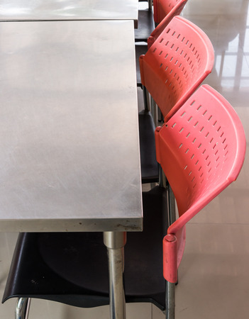 Metal chair and table set in the food court.