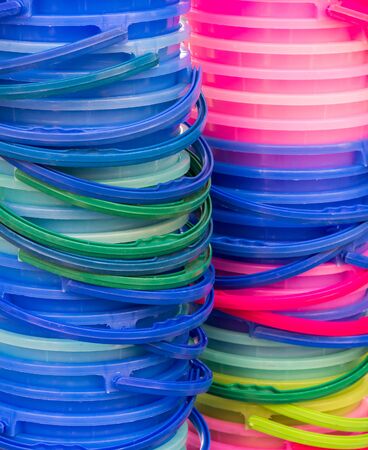 Colorful plastic bucket stack for ice cube in the Thai restaurant.の写真素材