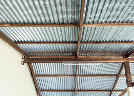 New zinc roof on the wooden frame of the countryside house.