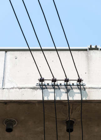 Small electric wire on the high bridge for electronic billboards of the express way.の写真素材
