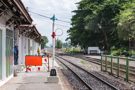 Safety loop on the signal pole for train driver take it before leaving the station,Thailand.の写真素材