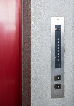 Control panel with the floor button of the old elevator in the office building.の写真素材