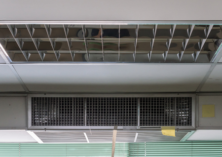 Ventilators of the old air conditioner on the ceiling office.