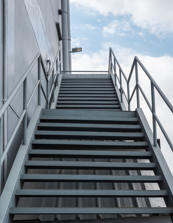 Metal staircase behind the factory for use to the fire exit in the emergency time.