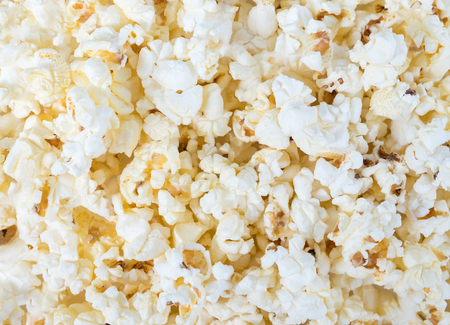 Fresh salted popcorn from the snack bar for ready to enjoy with the movie in the cinema.の写真素材