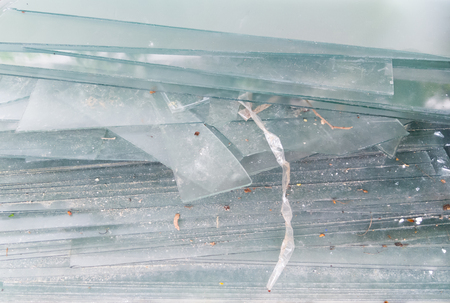 Broken glass stack before the renovation of the office building,ready to the recycle process.