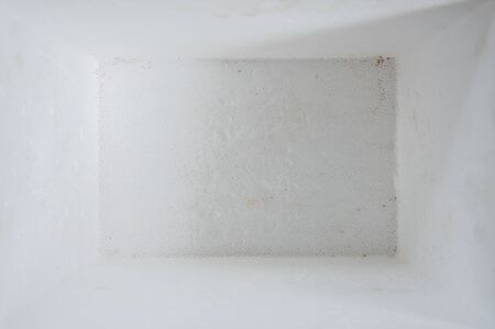 Inside view of the dirty foam box for contain the fresh seafood in the local market.の写真素材