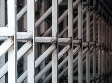 Selective focus of the metal structure behind the large billboard.