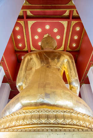 Rear view of the large golden Buddha statue in the Thai church.(Public area not required Property Release)のeditorial素材