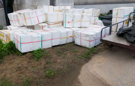 The  foam boxes for shipping are stacking near the platform to deliver with the train, cheap and...