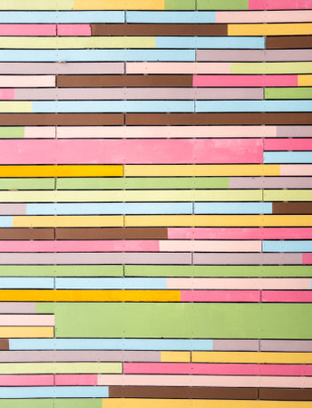 The planks are painted in a variety of colors on the ceiling of the kindergarten, front view for the background.の写真素材