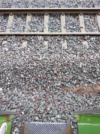 Railway track with pebbles, close-up, backgroundの写真素材