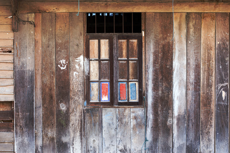 Wooden house, old wooden windowの写真素材