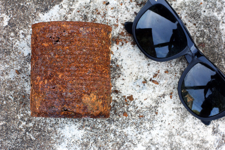Canned rust on the floorの写真素材