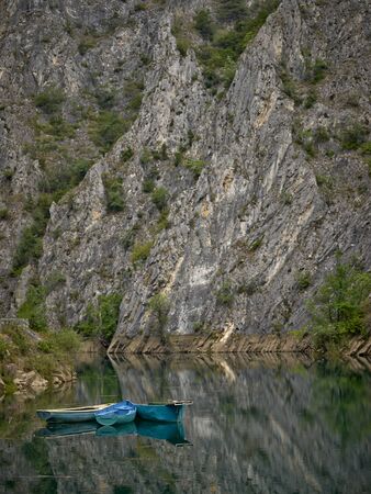  Three boats in gorge on the artificial lake     の写真素材