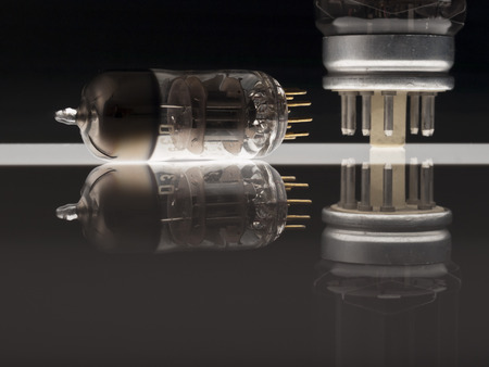 Vacuum tubes on black background  with reflectionの写真素材