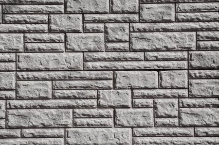 Gray wall texture with rectangular of different sizes and shapes, big, small, wide and narrow ones....