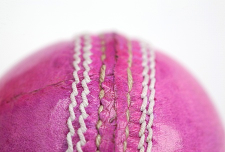 Detail of pink leather cricket ball の写真素材