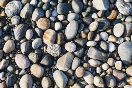 Pebbles on beach filling the frameの写真素材