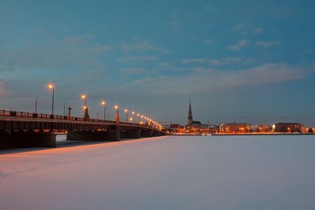 Night city bridge in winterの写真素材
