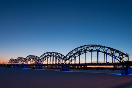 Railway bridge at night in winterの写真素材