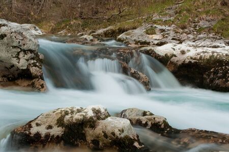 Waterfall with stones in wild natureの写真素材