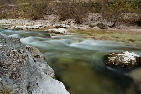 Waterfall with stones in wild natureの写真素材