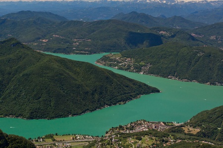 View from Monte Generoso down to Lugano and its lake in Switzerlandの写真素材