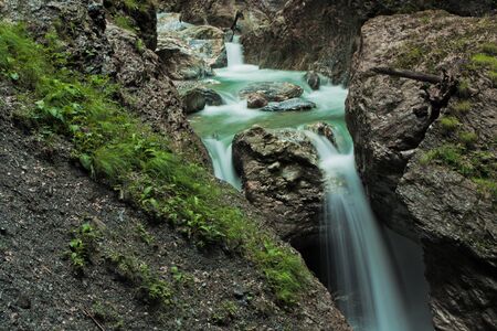 Waterfall in green nature in Austriaの写真素材