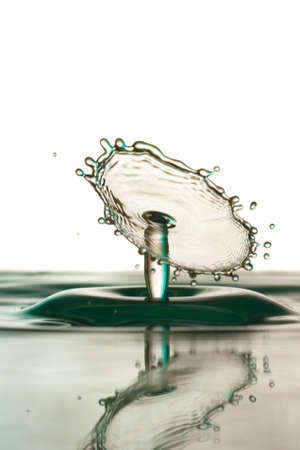 Water drop falling and colliding with another one