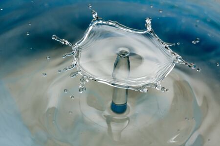 Water drop falling and colliding with another one