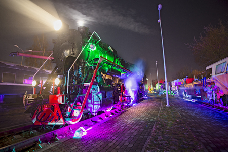 Soviet locomotive train colored at night