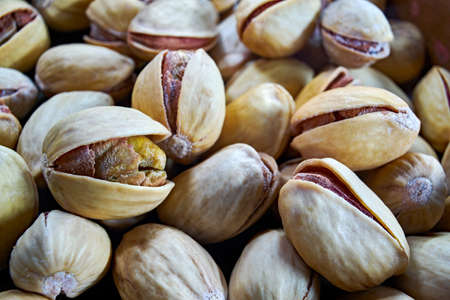 Pistachio nuts in a close-up, macroの写真素材