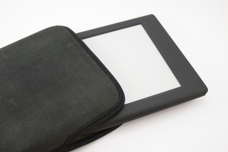 the tablet computer, the reader on the isolated backgroundの写真素材