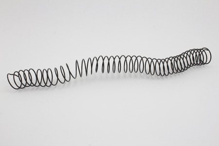 Black spring on the isolated white background