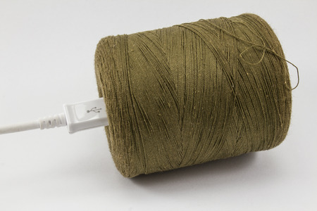 The coil of strings of the brown color, being recharged by means of electricity