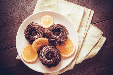 dark chocolate muffins on plateの写真素材