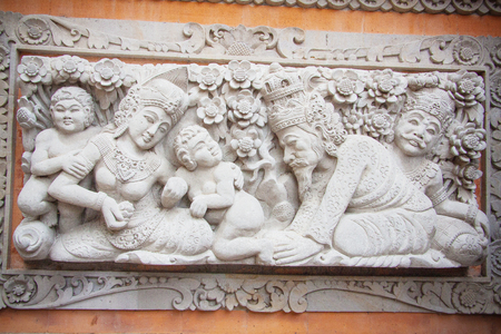 Green jungle and hindu artefacts in Bali; Indonesiaの写真素材