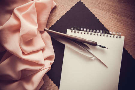 poetry & writing music concept background with orange background and postcard with copy spaceの写真素材