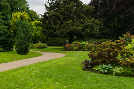 31 May 2019 Vienna, Austria - Forman gardens of Schonbrunn palace. Springtime cloudy dayのeditorial素材