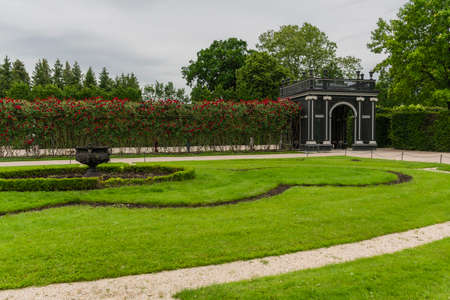 31 May 2019 Vienna, Austria - Forman gardens of Schonbrunn palace. Springtime cloudy dayのeditorial素材