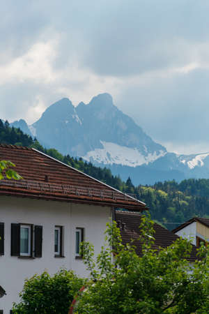 26 May 2019 Fussen, Germany - Small town Fussen, morning streets among Alpine mountains near Neuschwanstein castle and Hohenschwangau castle.のeditorial素材