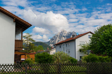 26 May 2019 Fussen, Germany - Small town Fussen, morning streets among Alpine mountains near Neuschwanstein castle and Hohenschwangau castle.のeditorial素材