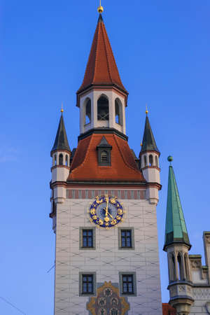 22 May 2019 Munich, Germany - Old city hall (Altes Rathaus / Spielzeugmuseum) and old Court (Alter Hof) former imperial residence of Louis IV. White tower with zodiac clock and muralsのeditorial素材