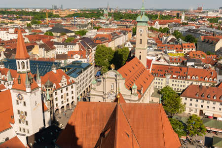 22 May 2019 Munich, Germany - Old city hall (Altes Rathaus / Spielzeugmuseum) and old Court (Alter Hof) former imperial residence of Louis IV. Aerial view from Peterskirche towerのeditorial素材