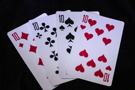 a deck of playing cards on a black background.の写真素材