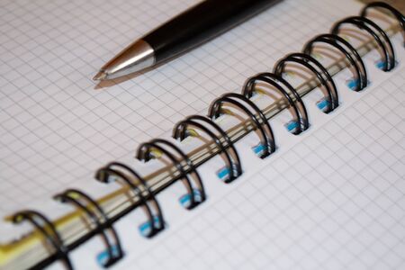 open notebook for writing or drawing with a ballpoint pen.の写真素材