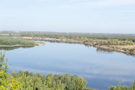 OKA river with vegetation on the banks, autumn landscapeの写真素材